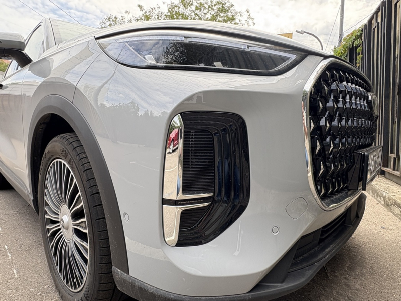 Скромняга, способный удивить: тест-драйв Chery Tiggo 9